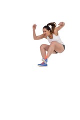 Athletic woman running on white background