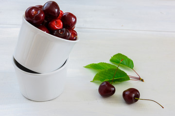 fresh cherries on wooden table