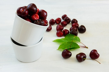 fresh cherries on wooden table