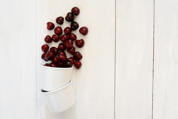 fresh cherries on wooden table