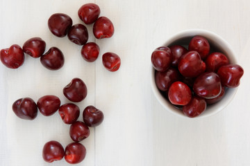 fresh cherries on wooden table