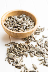 Unpeeled sunflower seeds.