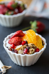 Granola with Orange,Strawberry on yogurt