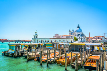 Venice boat station Italy. / View at boat station and famous basilica in Venice Italy, spring time.