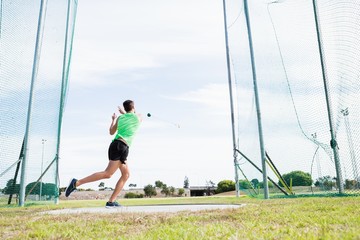 Athlete performing a hammer throw