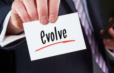 Man holding a business card evolve Concept