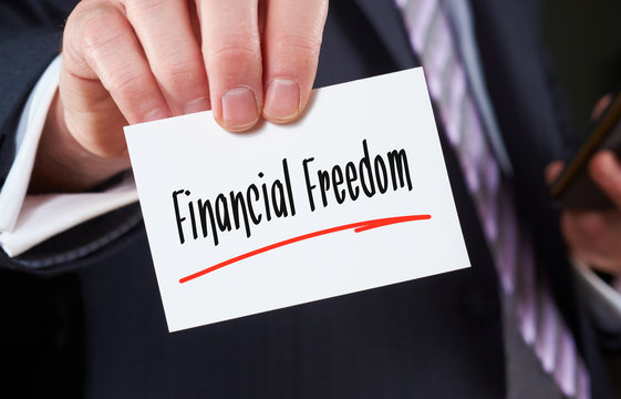 Man holding a business card financial freedom Concept