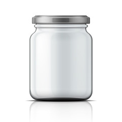 Empty glass jar with screw cap.