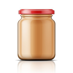 Glass jar with peanut butter.