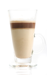 Latte macchiato in transparent glass isolated on white backgroun