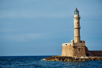 Fototapeta na wymiar bay of Chania with lighthouse at sunny summer day, Crete, Greece