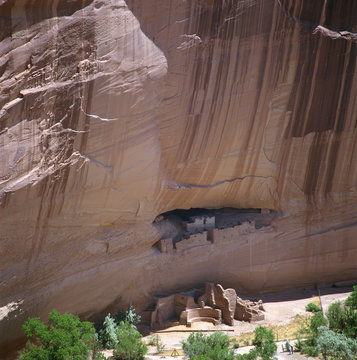 Cliff dwellings under the rock face in the Canyon de Chelly, Arizona