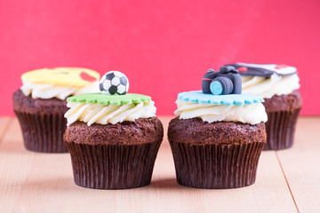 Delicious cupcakes on table