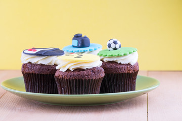 Delicious cupcakes on table