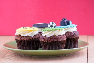 Delicious cupcakes on table