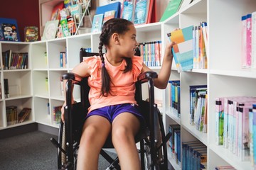 Girl sitting in a wheelchair © WavebreakmediaMicro