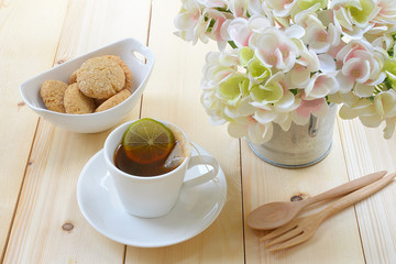 Hot lemon tea with oat cookies.