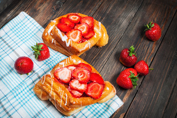 dessert fruit cakes with strawberry on wood background