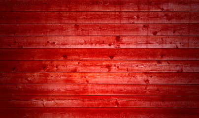 Rote breite Holzbretter