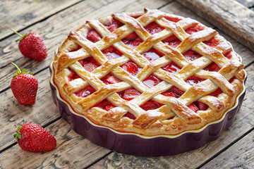 Baked strawberry pie cake sweet pastry on rustic wooden table background - Powered by Adobe