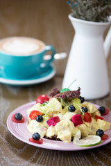 delicious fruit salad on table