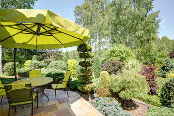 Garden furniture and umbrella