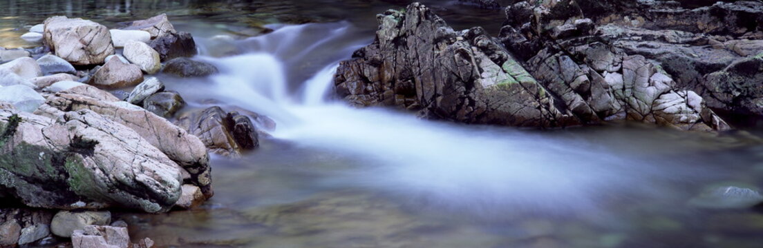 River Nevis flowing between rocks, Glen Nevis, near Fort William, Western Highlands, Scotland
