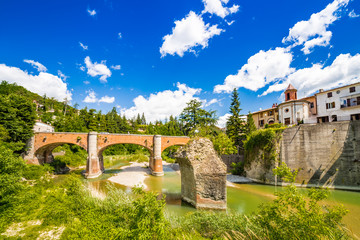 river under twelfth century bridge