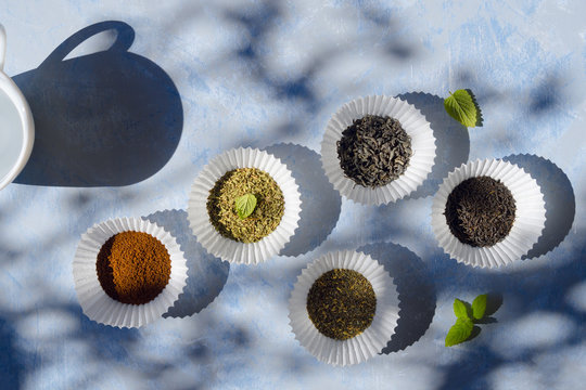 Grounded coffee and different types of teas: green, black, mint and herbal