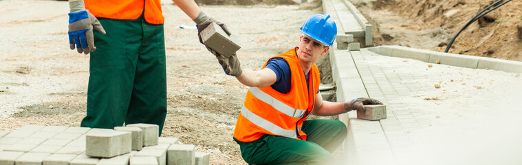 Workers are helping each other