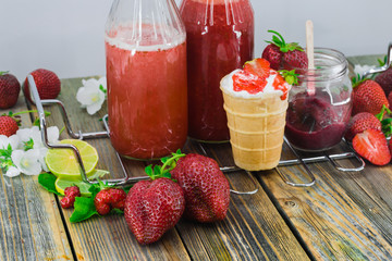 fresh smoothie with berries on wooden background