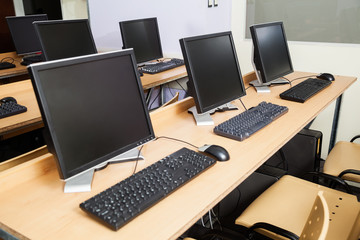 Computers On Desks In Classroom
