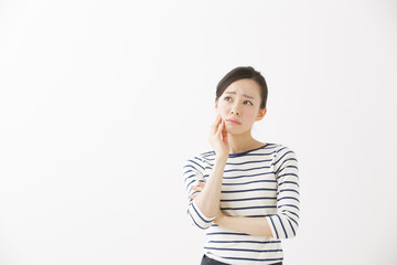 Obraz premium 悩む女性・サービス業