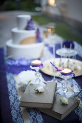 Wedding table arrangement with different ornaments