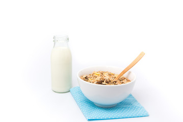 Delicious and healthy cereal in bowl with milk. Morning breakfas