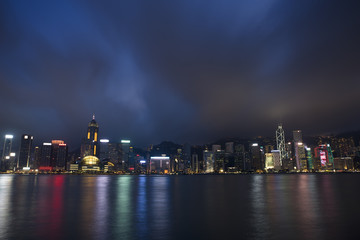 Naklejka premium Night city scape on Hong Kong Harbour.