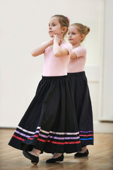 Young Girls In Costume During Character Ballet Dancing Class