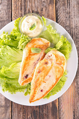 grilled chicken breast and salad