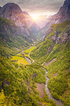Beautiful sunrise scene over mountain and Green Valley, Norway Mountain Landscape, Odda, Norway
