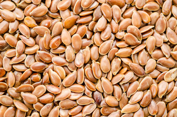 Brown flax seed background.