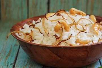 Ghee Rice / Nei choru - Rice cooked in clarified butter granished with fried onions and nuts