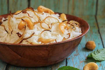 Ghee Rice / Nei choru - Rice cooked in clarified butter granished with fried onions and nuts