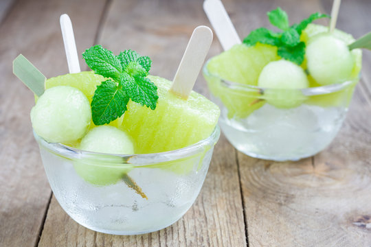 Homemade melon popsicles in the glass, closeup