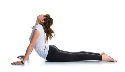Plakat Young girl with dreadlocks doing yoga