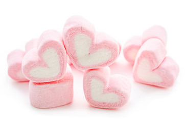 a group of marshmallows heart shape.