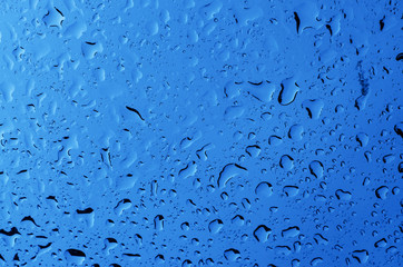 Blue water drops background