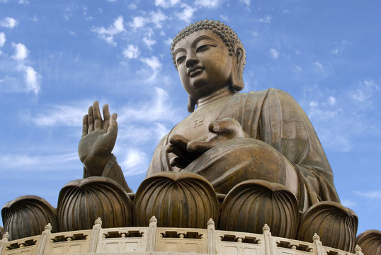 The giant bronze Tian Tan Buddha statue sits on a lotus throne