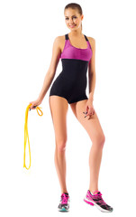 Young sporty girl with skipping rope