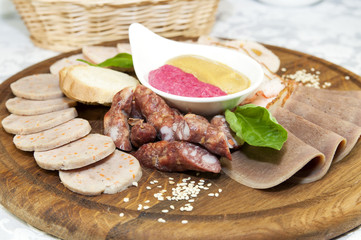 meat dish with several kinds of sausages