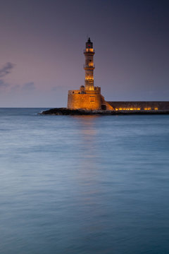 Europe, Greece, Greek Isles, Crete, Chania, Old Harbor, Venitian Lighthouse, Dusk, Evening lights